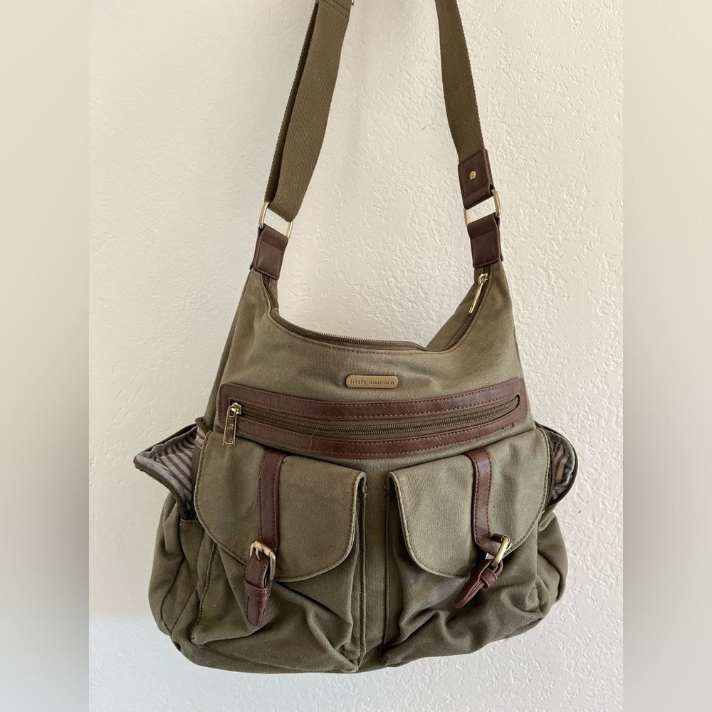 Little Unicorn brand over the shoulder messenger bag with many pockets